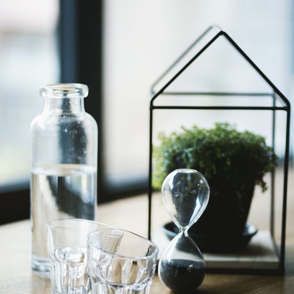 Minimalist hourglass on a wooden table